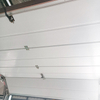 Porte de garage électrique en cuivre à main civile anti-pincement de style carré blanc