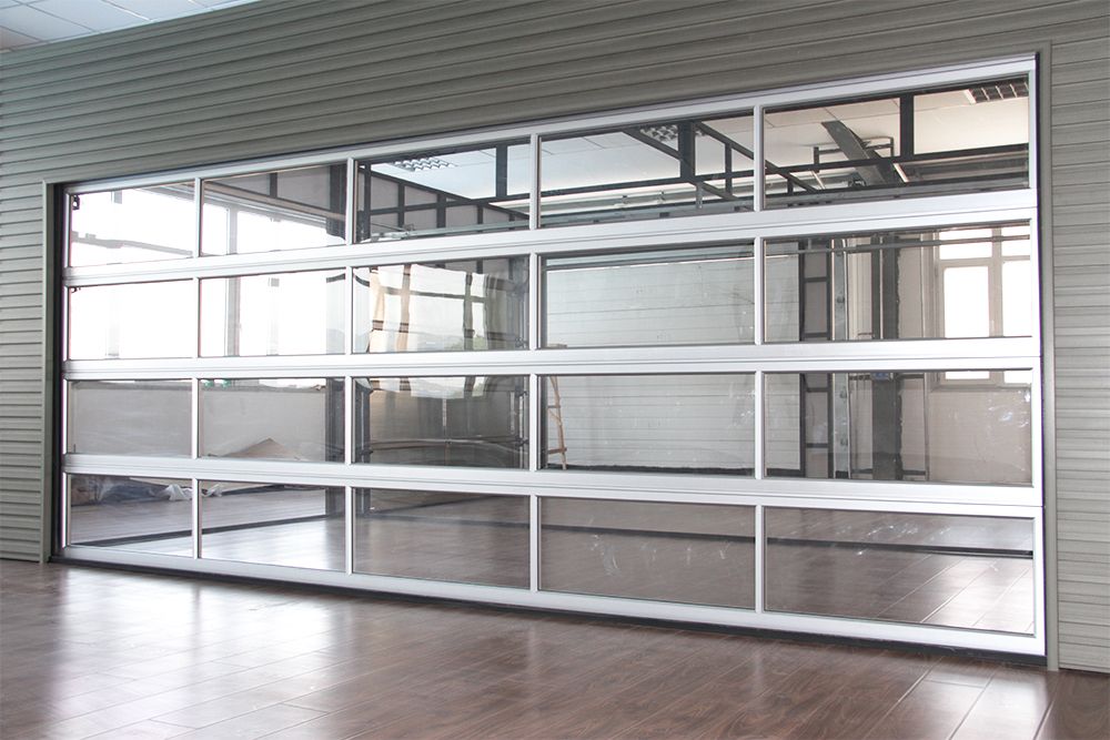 Portes de garage pleine vue en verre et aluminium